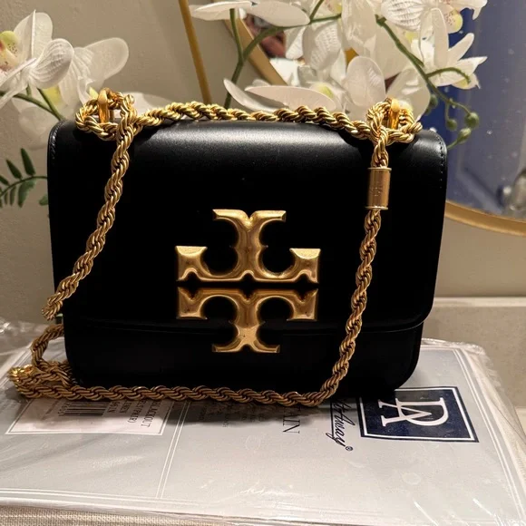 Tory Burch Black Crossbody Bag with Gold Accent - Picture 3 of 5